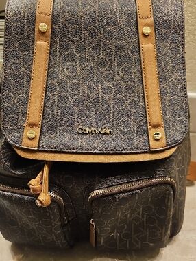 Calvin Klein Men’s Monogram Brown Canvas Backpack with Contrast Trim